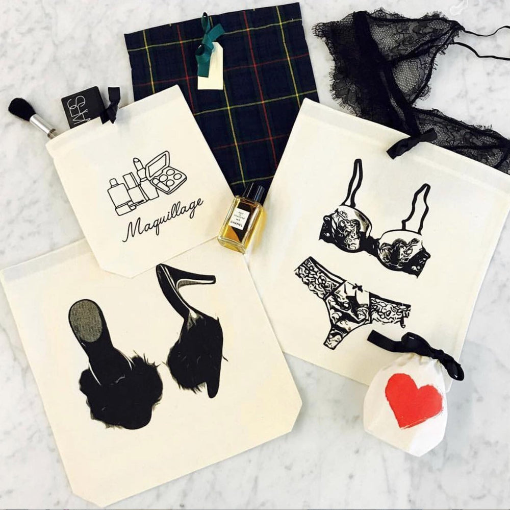 
                                      
                                        Lace lingerie, makeup, feather slipper shoe bag and a lace lingerie bag. 
                                      
                                    
