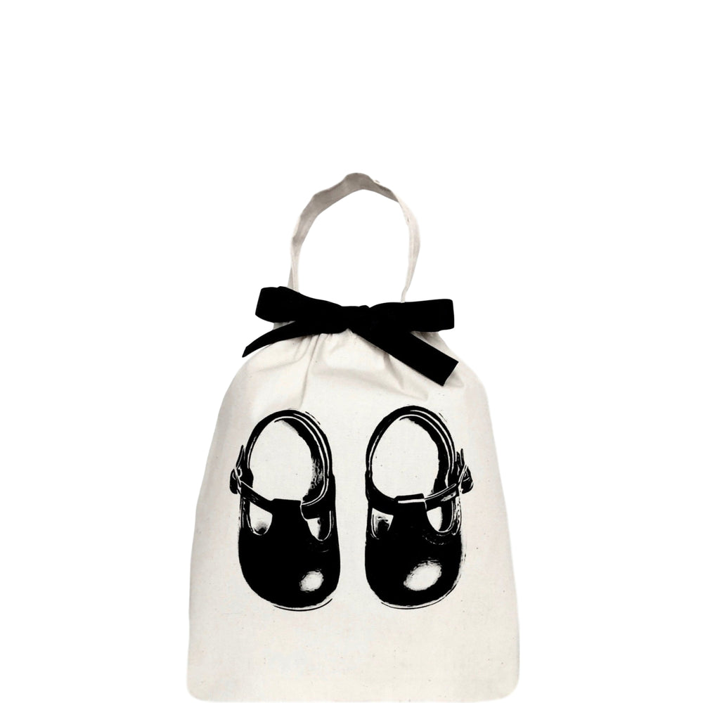 
                                      
                                        Baby shoe bag in white with baby shoes printed on the front. The bag has a handle and black ribbon.
                                      
                                    