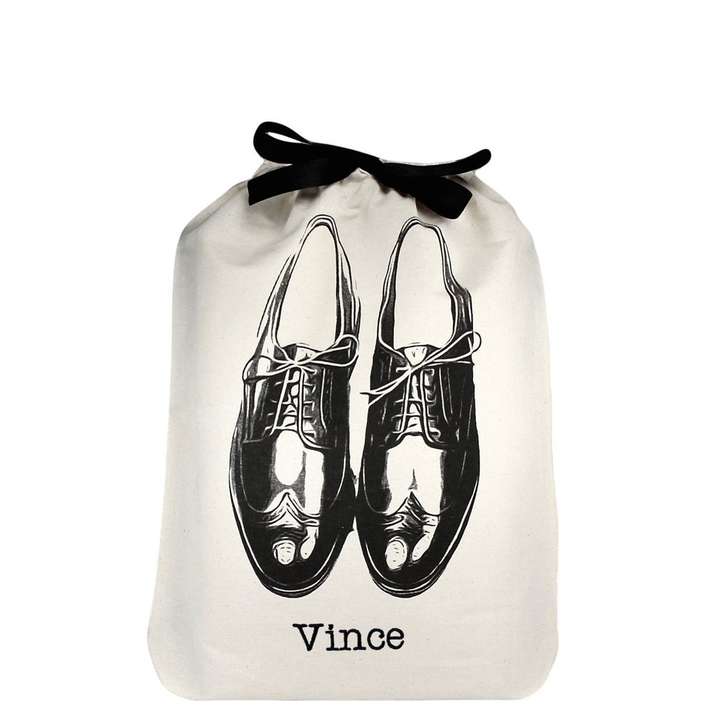 
                                      
                                        Men's shoe bag with "vince" printed on the front of the bag. 
                                      
                                    