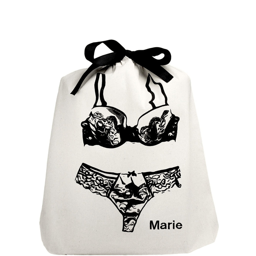 
                                      
                                        Lace lingerie bag with "marie" monogrammed on the bottom. 
                                      
                                    